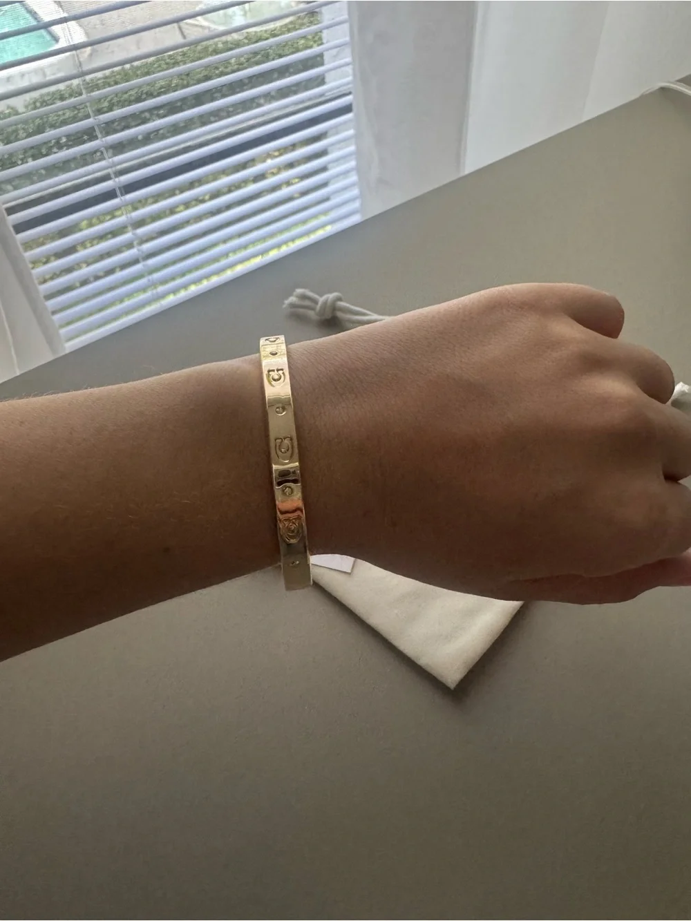 Coach Gold Tone Signature C Logo Bangle Bracelet